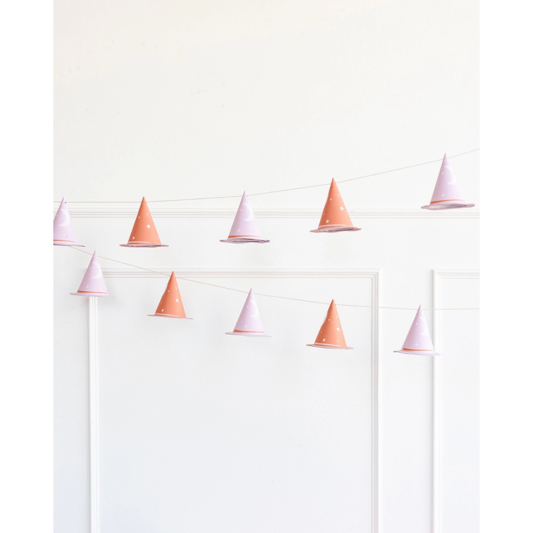 Pink and orange witch hat garland Halloween decor from Parte Haus party supply store in Bethesda Maryland