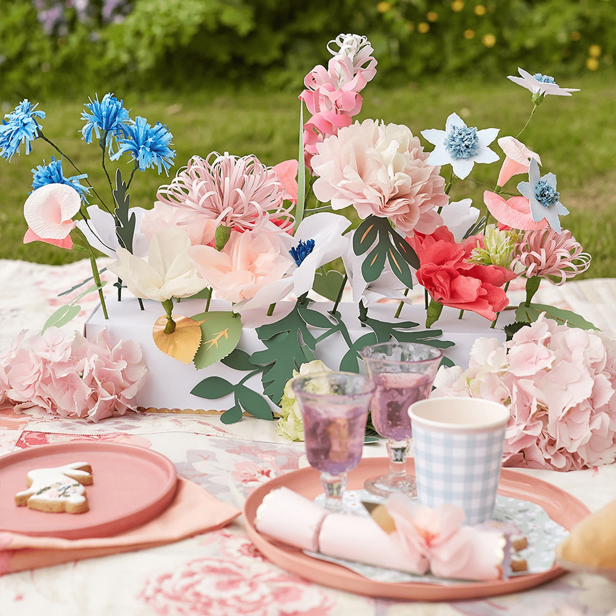 Pink blue and white paper flower centerpiece spring picnic decor from Parte Haus party supply store in Bethesda MD