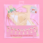 Pink cocktail banner decoration with martini glasses for bachelorette party from Parte Haus party supply store in Bethesda MD.