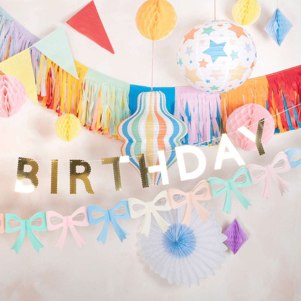 Colorful birthday decorations pastel banner garlands balloons from Parte Haus party supply store in Bethesda Maryland