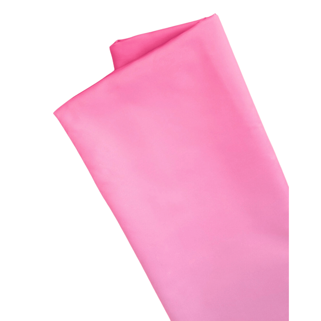 Pink table cover smooth finish for birthday theme from Parte Haus party supply store in Bethesda Maryland