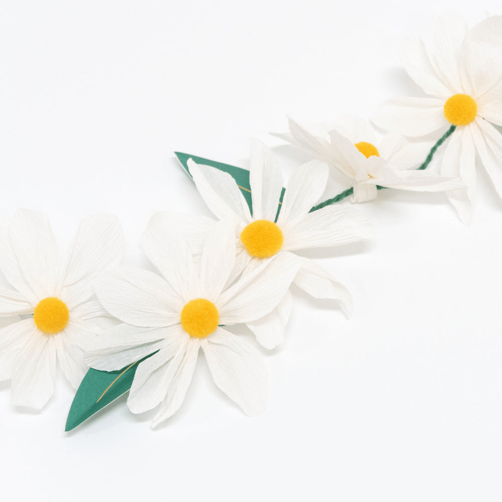 White yellow flower garland with green leaves spring theme from Parte Haus party supply store in Bethesda MD