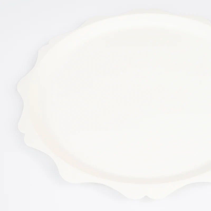 White scalloped edge plate classic design from Parte Haus party supply store in Bethesda Maryland