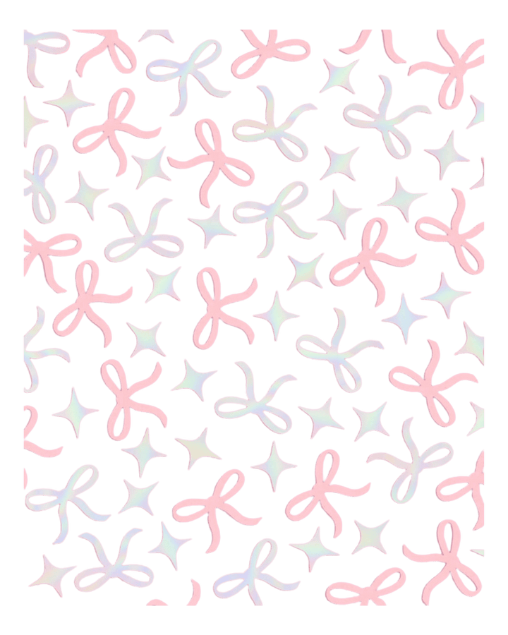 Pastel pink and white bow and star pattern gift wrap birthday theme from Parte Haus party supply store in Bethesda MD