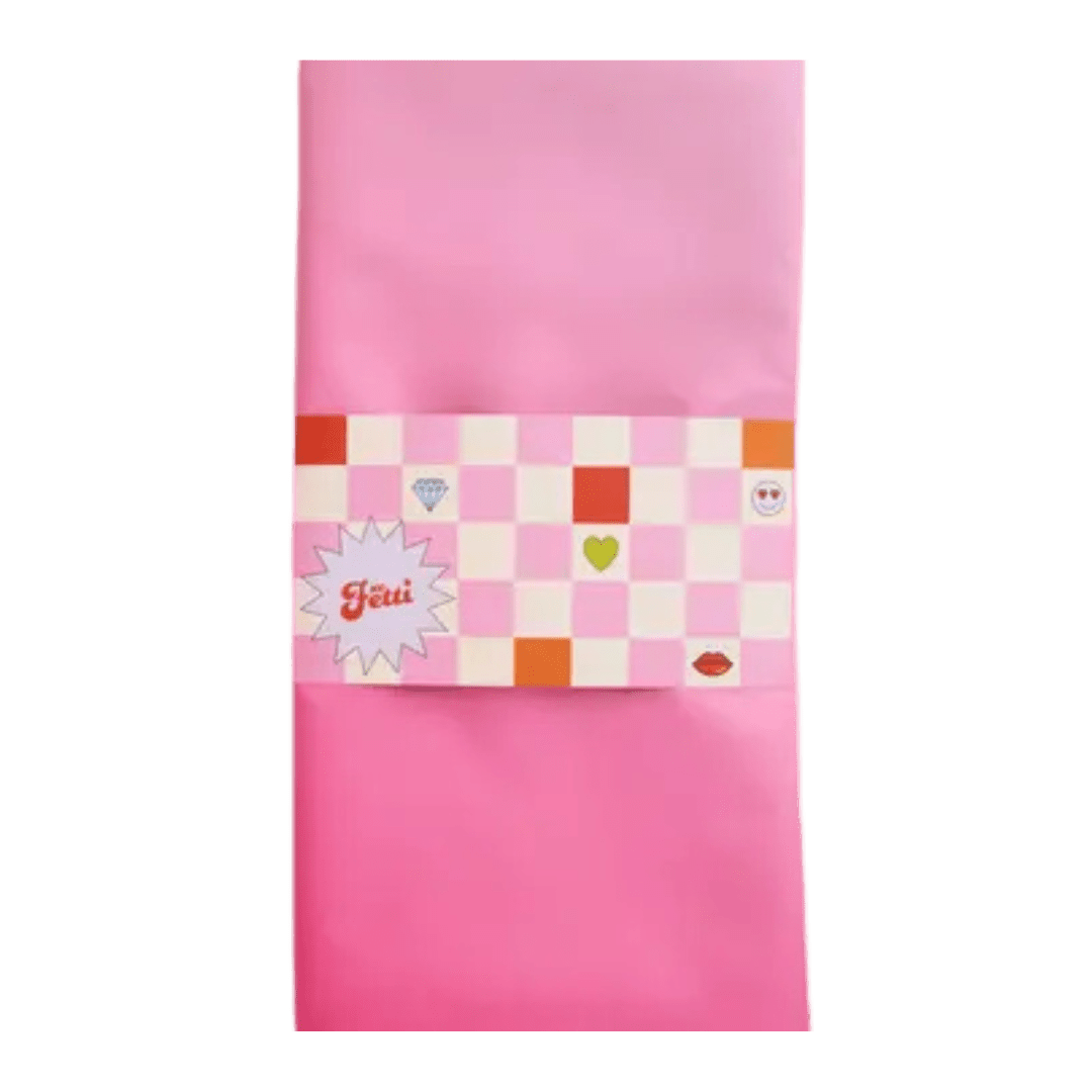Pink gift wrap with checkered tag and fun icons celebration from Parte Haus party supply store in Bethesda MD