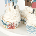 Blue and white pirate cupcake wrappers with nautical sea designs for birthday theme from Parte Haus party supply store in Bethesda MD