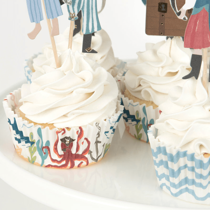 Blue and white pirate cupcake wrappers with nautical sea designs for birthday theme from Parte Haus party supply store in Bethesda MD