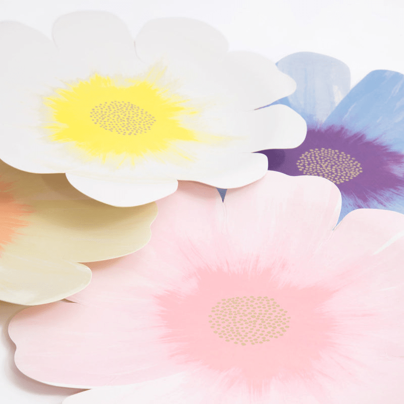 Pastel flower shaped plates with yellow pink and purple accents spring theme from Parte Haus party supply store in Bethesda Maryland