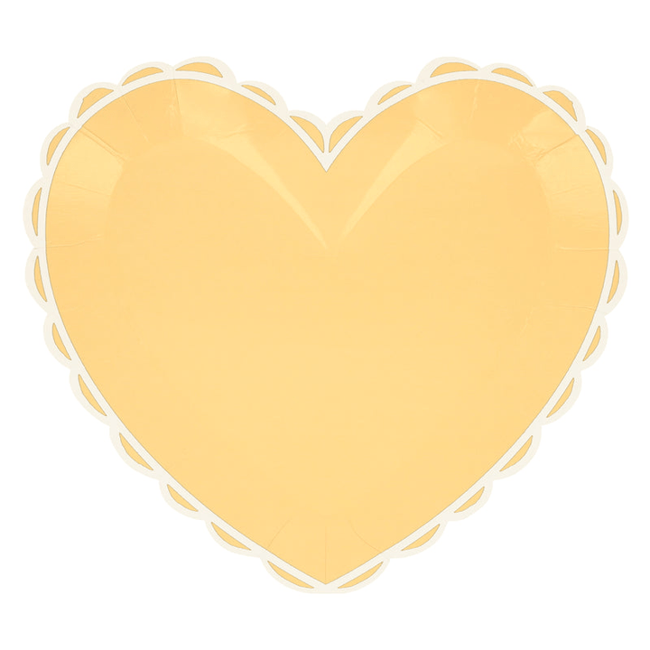 Yellow heart-shaped plate with scalloped edge for celebration from Parte Haus party supply store in Bethesda, MD