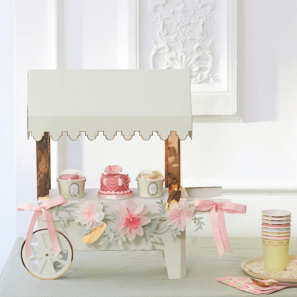 White and gold cupcake stand with pink floral accents for birthday theme from Parte Haus party supply store in Bethesda MD