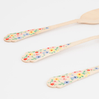 Multicolor floral wooden cutlery with painted handles for spring theme from Parte Haus party supply store in Bethesda MD