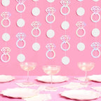 Iridescent ring garland bridal shower backdrop pink table setting from Parte Haus party supply store in Bethesda MD.