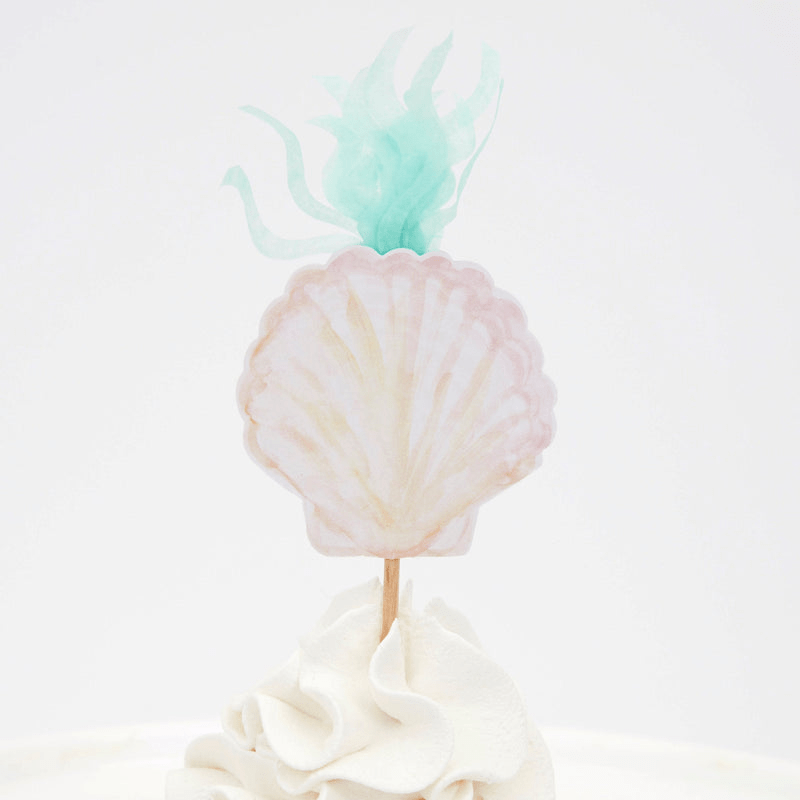 Pastel seashell cake topper with mint seaweed detail under the sea theme from Parte Haus party supply store in Bethesda MD