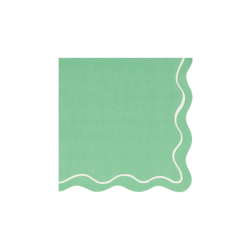 Mint green napkin with scalloped edges for birthday celebration from Parte Haus party supply store in Bethesda Maryland.