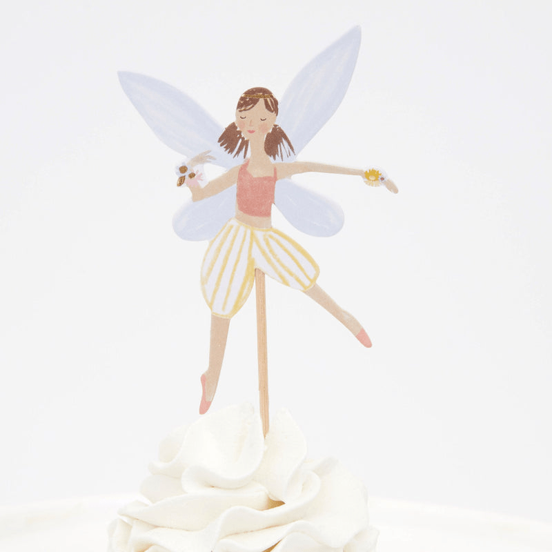 Pastel fairy cake topper with wings for birthday from Parte Haus party supply store in Bethesda Maryland