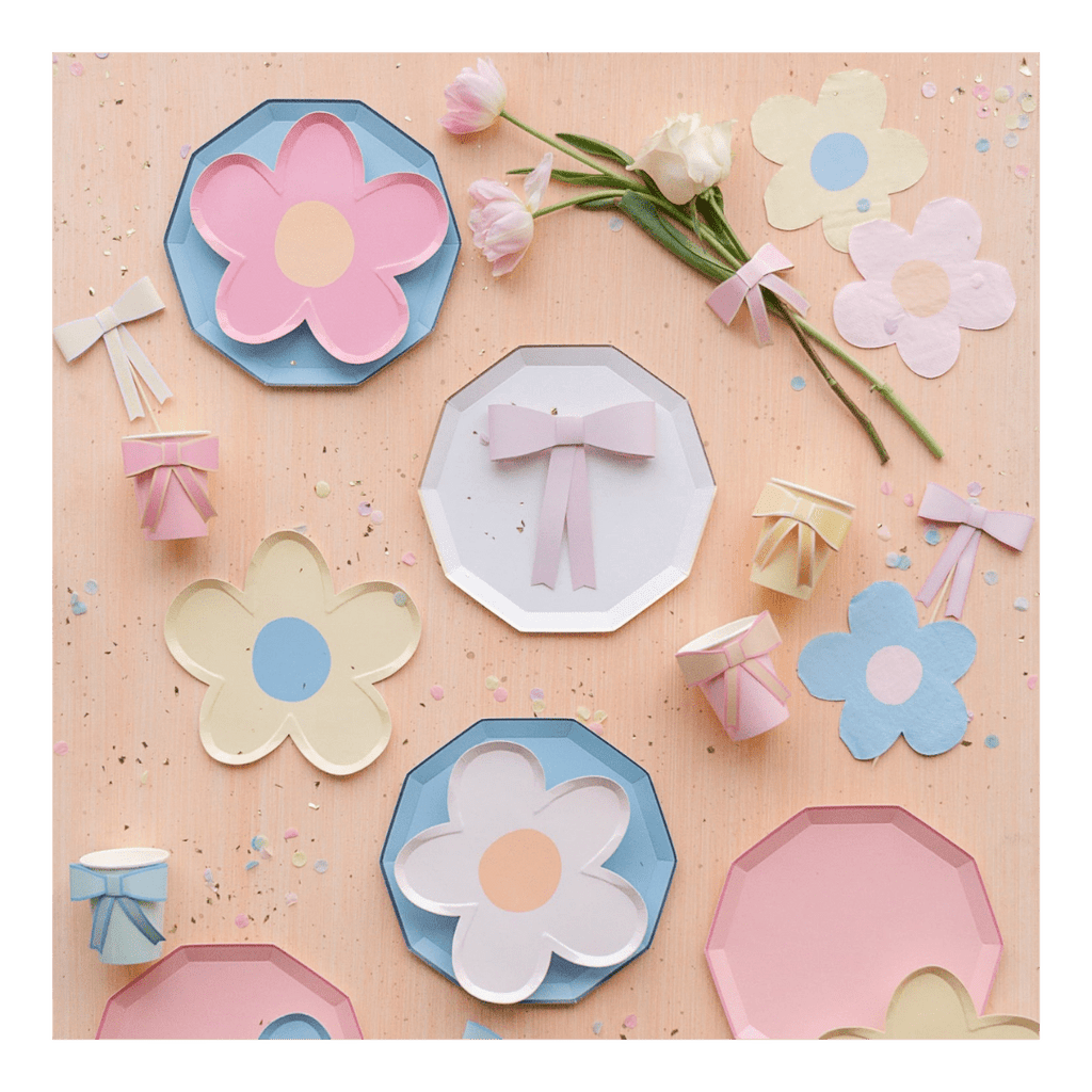 Pastel floral and bow paper plates and cups birthday theme from Parte Haus party supply store in Bethesda MD.