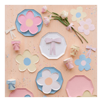 Pastel floral and bow paper plates and cups birthday theme from Parte Haus party supply store in Bethesda MD.