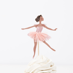 Pink ballerina cupcake topper with fluffy white frosting ballerina birthday from Parte Haus party supply store in Bethesda MD.