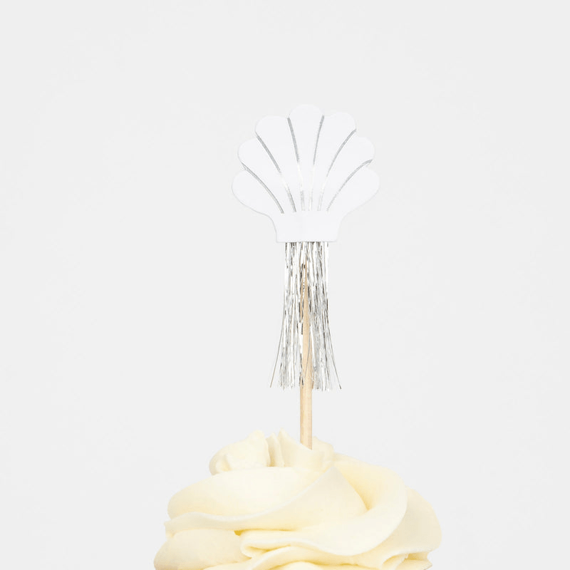 White and silver shell cupcake topper with metallic fringe for beach theme from Parte Haus party supply store in Bethesda Maryland