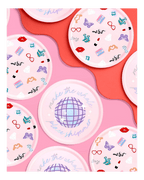Pink disco party plates with playful icons and a purple disco ball theme from Parte Haus party supply store in Bethesda MD