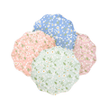 Pastel floral paper plates with scalloped edges spring garden theme from Parte Haus party supply store in Bethesda MD.