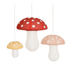 Red yellow pink mushroom paper lanterns whimsical forest birthday theme from Parte Haus party supply store in Bethesda Maryland