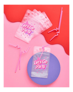 Pink Let's Go Party drink pouch with curly straw birthday theme from Parte Haus party supply store in Bethesda Maryland