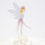 Pastel fairy cake topper with wings ballerina theme from Parte Haus party supply store in Bethesda Maryland