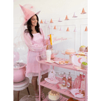 Pink witch theme decor and tableware with desserts for Halloween from Parte Haus party supply store in Bethesda Maryland