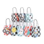 Colorful checkered treat bags with monster truck smiley robot dinosaur race car birthday theme from Parte Haus party supply store in Bethesda MD