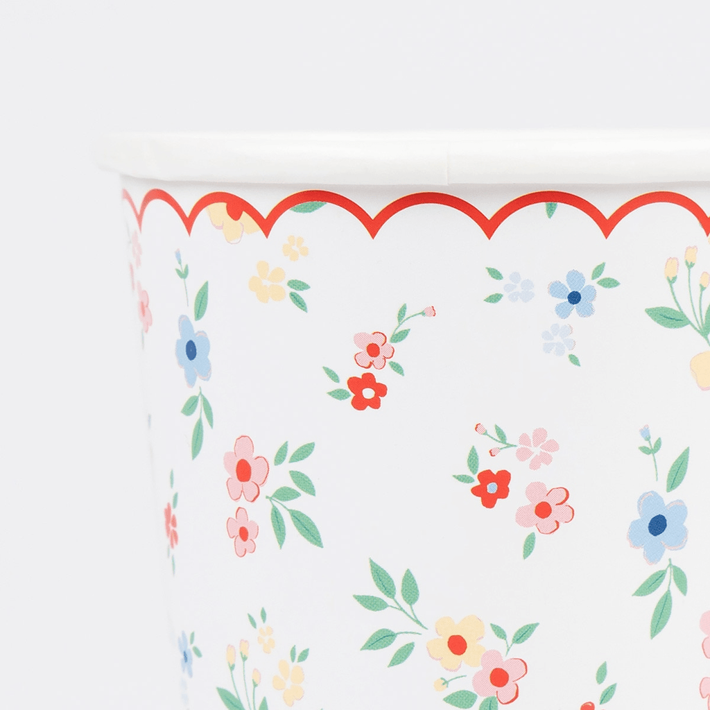 Multicolor floral paper cup with scalloped red edge for spring celebration from Parte Haus party supply store in Bethesda MD.