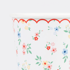 Multicolor floral paper cup with scalloped red edge for spring celebration from Parte Haus party supply store in Bethesda MD.