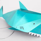 Teal shark shaped paper garland for ocean theme birthday from Parte Haus party supply store in Bethesda MD