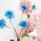 Blue and pink paper flower bouquet vibrant decor centerpiece for birthday event from Parte Haus party supply store in Bethesda MD