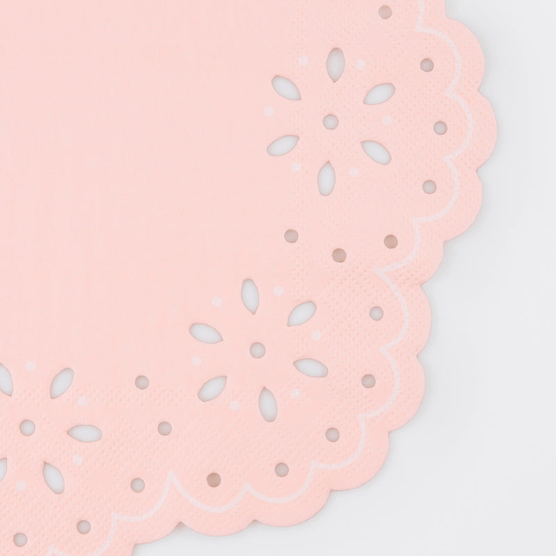 Light pink paper doily with scalloped edge floral cutouts for birthday from Parte Haus party supply store in Bethesda MD