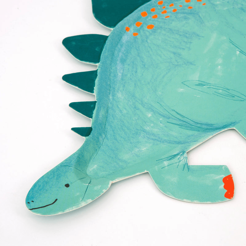 Blue dinosaur shaped paper plate with orange spots kids birthday theme from Parte Haus party supply store in Bethesda Maryland