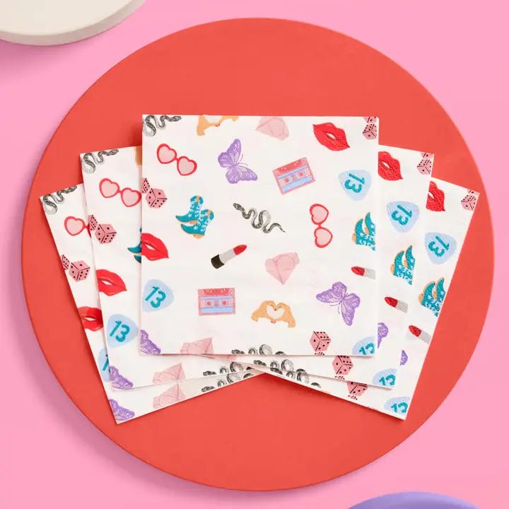 Colorful printed napkins with hearts lips butterflies and dice for celebration from Parte Haus party supply store in Bethesda Maryland