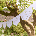 White paper banner bunting with lace pattern outdoor garden decor from Parte Haus party supply store in Bethesda Maryland