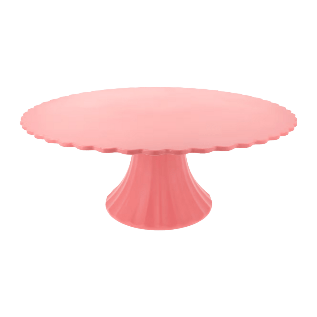 Pink cake stand with scalloped edge for birthday celebration from Parte Haus party supply store in Bethesda MD.
