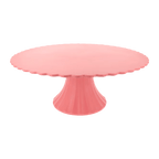 Pink cake stand with scalloped edge for birthday celebration from Parte Haus party supply store in Bethesda MD.