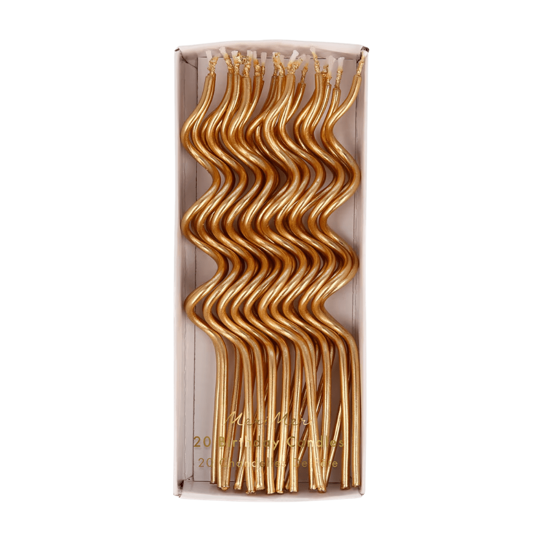 Gold birthday candles with wavy shapes birthday theme from Parte Haus party supply store in Bethesda, Maryland