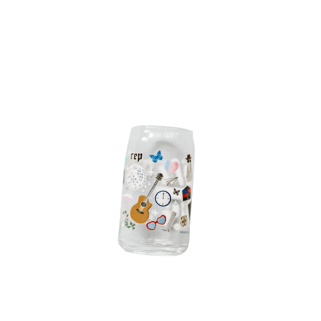 Clear glass cup with colorful sticker designs music celebration theme from Parte Haus party supply store in Bethesda MD