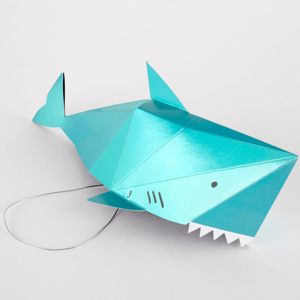 Blue shark shaped piñata with fins ocean theme decoration from Parte Haus party supply store in Bethesda MD