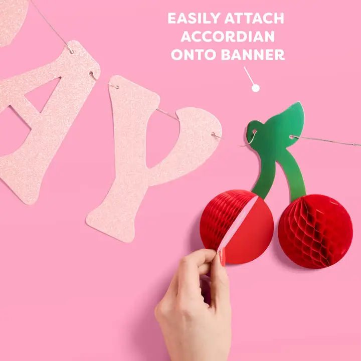 Pink and red cherry letter banner for birthday from Parte Haus party supply store in Bethesda Maryland