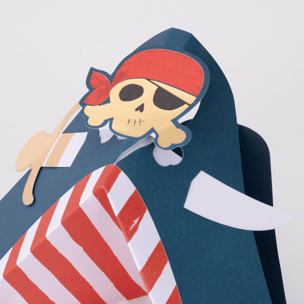 Red and navy blue pirate themed card with skull illustration kids birthday from Parte Haus party supply store in Bethesda MD