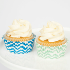 Blue and green striped cupcake wrappers with vanilla cupcakes birthday theme from Parte Haus party supply store in Bethesda MD.