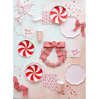 Red and white Christmas tableware with bows wreaths and festive napkins holiday theme from Parte Haus party supply store in Bethesda MD