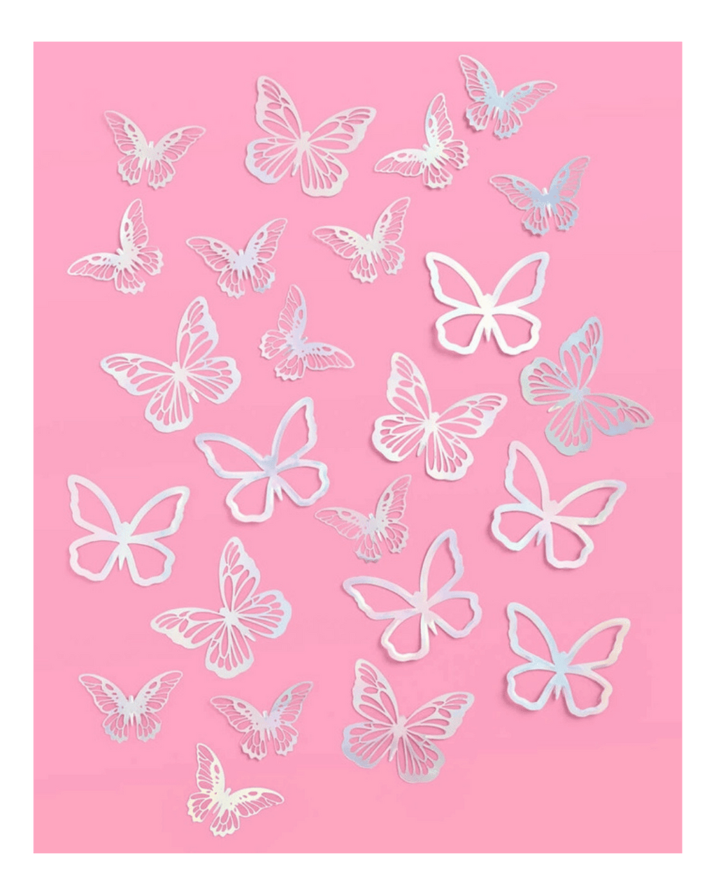 White butterfly wall decals with delicate cutout shapes for birthday decor from Parte Haus party supply store in Bethesda MD.