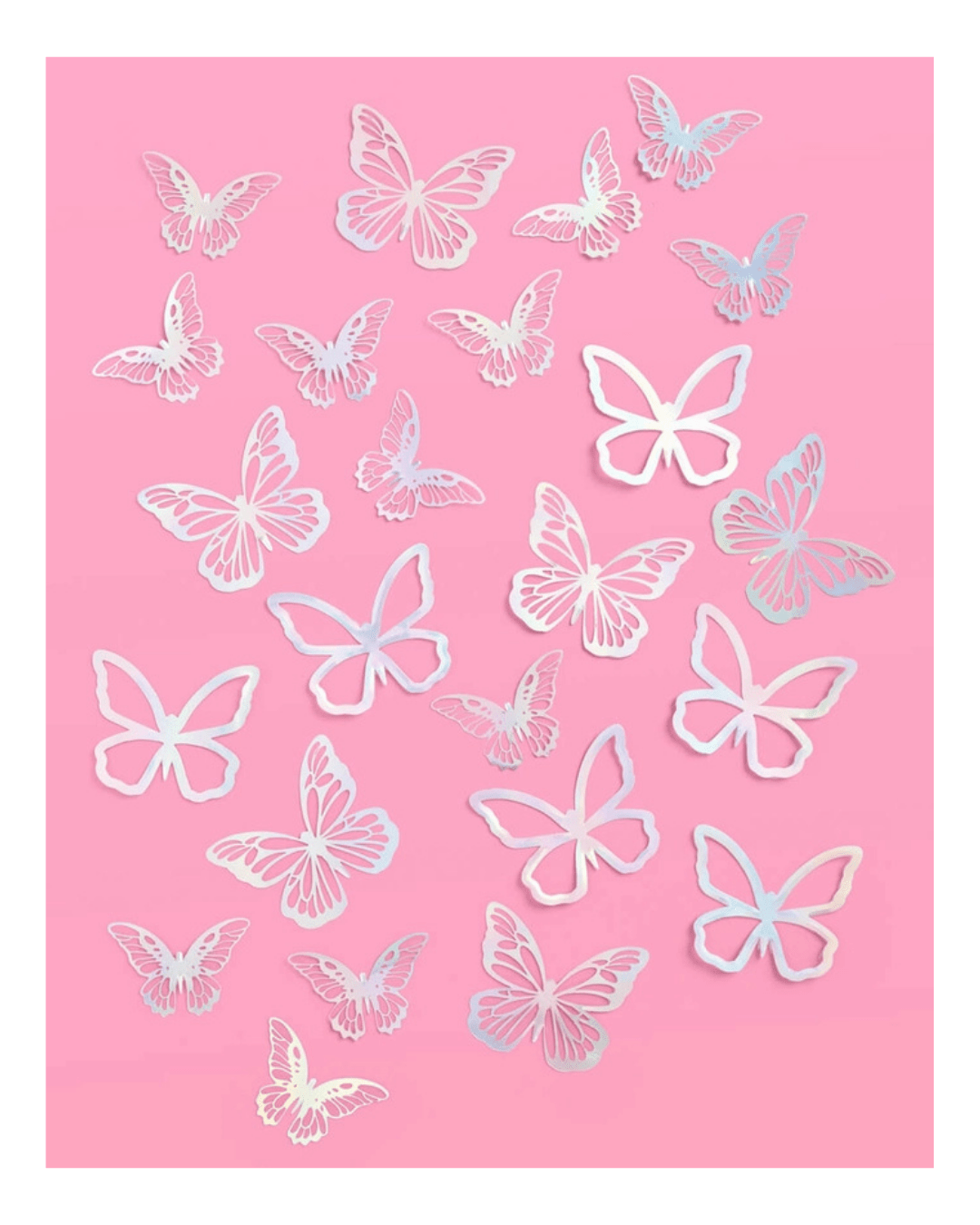 White butterfly wall decals with delicate cutout shapes for birthday decor from Parte Haus party supply store in Bethesda MD.