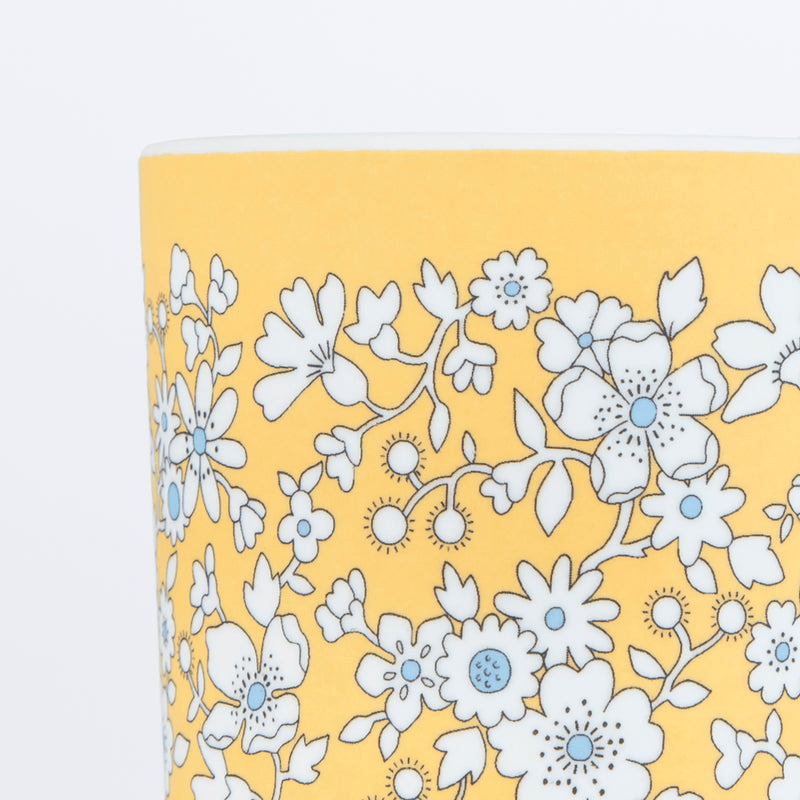 Yellow floral paper cup with white and blue flowers spring theme from Parte Haus party supply store in Bethesda MD